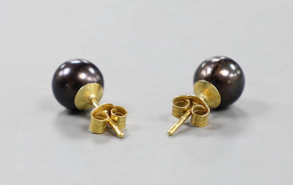 A pair of 18ct and cultured Tahitian pearl set ear studs.